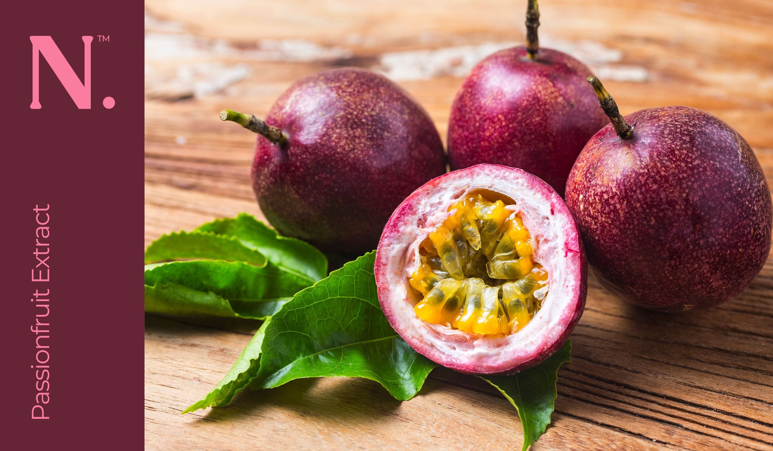 four passion fruits with one showing extract